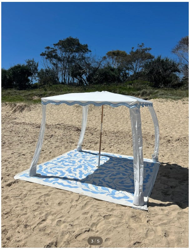 Sundayz Collective beach setup – cabana and mat on South African coastline